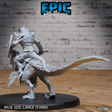 Rear view of an armoured dragonborn raptor rider, showing scaled back armour, spiked pauldrons, and the raptor's detailed feathered body and long feathered tail. Sculpt by Epic Miniatures.
