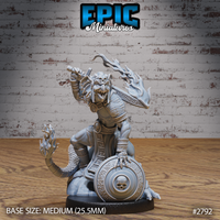 Snarling kobold champion gripping a rune-etched sword overhead, flame-wreathed clawed hands, skull pauldron, chainmail chest, kneeling atop a skull-motif shield. Sculpt by Epic Miniatures.