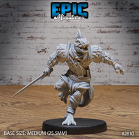 Lizardman Tribe Warrior by Epic Miniatures — snarling reptilian fighter mid-stride, one knee raised, sword extended low in a forward thrust, wearing shoulder armour and a belted fabric wrap.