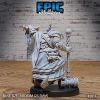 Epic Miniatures render sheet showing three lizardfolk miniature variations at medium size: a robed alchemist holding flasks, an armoured warrior with sword and wing-headed axe, and a horned commander.