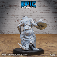 Lizardfolk figure in flowing robes seen from behind, belt pouches and a bundled sack at the waist, scaled tail visible, carrying a flat dish in one hand. Sculpt by Epic Miniatures.