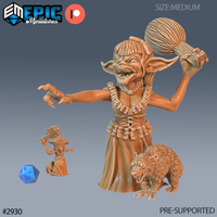 Digital render of an unpainted resin Goblin Diva miniature at 32mm scale — a female goblin in tribal wrappings and shell-bead necklaces, swinging a large woven gourd club overhead with one clawed hand outstretched, teeth bared in fury, with a bristling raccoon crouching at her feet and a smaller secondary sculpt showing the same character in a calmer pose holding an instrument, with a blue d20 for scale reference