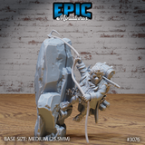 Halfling traveler miniature gripping a rope and scaling a jagged rocky cliff, wearing a long coat and carrying a large backpack with bedroll and tools. Sculpt by Epic Miniatures.