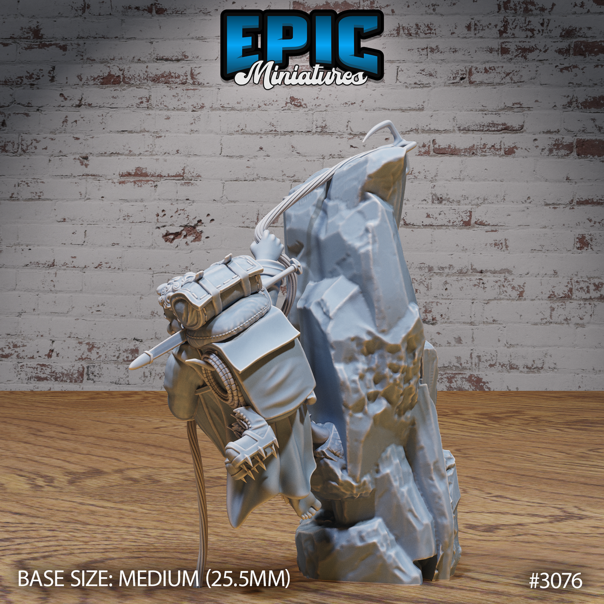 Halfling climber miniature seen from behind, pressed against a tall rocky cliff face with cramponed feet braced against the stone and a fully laden adventurer's pack on their back. Sculpt by Epic Miniatures.