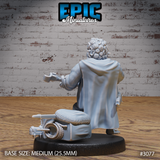 Halfling musician seen from behind, broad coat draped across his back, one arm raised mid-strum, spiked travel pack and coiled rope visible at his feet. Sculpt by Epic Miniatures.