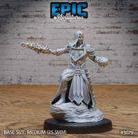 Hooded warlock in armoured robes, arms outstretched, holding a skull-covered gauntlet forward and raising another behind. Engraved breastplate, layered tabard, rocky base. Epic Miniatures sculpt.