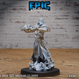Hooded warlock thrusting a gauntleted fist forward, wreathed in swirling eldritch energy, wearing layered robes and armoured pauldrons over a belted coat with angular hem detailing, standing on a flame-sculpted scenic base. Sculpt by Epic Miniatures.