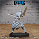 Bald monk seen from behind mid-stance, one broad heavy sword raised high and one slender blade extended low, muscular back exposed, flowing robes and wide-legged pose. Sculpt by Epic Miniatures.