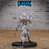 Female werewolf warrior seen from behind, revealing dense bone-like protrusions across the back armour, feathered pauldrons, a skull trophy at the ankle, and long shaggy fur beneath the plate. Sculpt by Epic Miniatures.