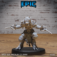 Female werewolf miniature crouched in attack stance, arms spread wide holding two bone-handled daggers, snarling wolf-head hood, layered stone pauldrons and segmented plate armour. By Epic Miniatures.