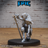 Kneeling elf female fighter miniature with long flowing hair, planting an ornate long sword beside her, one hand reaching forward with clawed fingers. Feathered back elements and layered leather armour. Sculpt by Epic Miniatures.