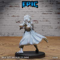 Female bard from behind showing a full sweep of long wild hair, billowing cape, structured shoulder armour, and buckled coat. Sculpt by Epic Miniatures.