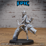 Female elf ranger perched sideways on a curved sculpted branch, holding a gnarled staff, with a quiver of arrows on her back and long braided hair falling loose. Sculpt by Epic Miniatures.