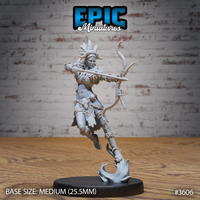 Unpainted grey resin 32mm miniature of a tribal female archer mid-stride, feathered and horned headdress, bow drawn and aimed, skull trophy at her belt, feather-and-hide mantle, dynamic swirling flame base — front view