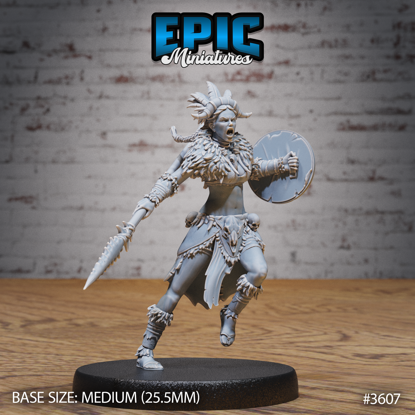 Front view of an unpainted grey resin 32mm miniature of a female tribal barbarian warrior, mid-charge with a serrated blade in her right hand and a round bossed shield in her left, wearing a horned feathered headdress, beast pelt mantle, and skull belt trophies, mounted on a medium round black base — by Epic Miniatures