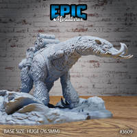 Side-view render of the Giant Sloth Mount miniature by Epic Miniatures — an unpainted grey resin model showing a huge shaggy sloth with curved tusks, powerful claws gripping a rocky snow-covered base, and a detailed steampunk harness with riveted canisters and cargo equipment across its back. Huge 76.5mm base size shown.