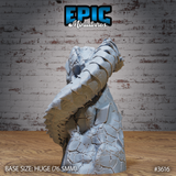 Rear three-quarter view of the unpainted grey resin Frost Worm Climbing miniature by Epic Miniatures — showing the layered dorsal scales, coiling body mass, and sweeping tail detail on the 76.5mm Huge base