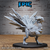 Unpainted grey resin Turkey Raptor miniature from Epic Miniatures, front view — large bird-raptor hybrid with a wide fan of oversized blade-shaped feathers, scaled taloned feet, beaked head with wattle, mounted on a 51mm large round base