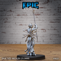 Rear three-quarter view of the same unpainted grey resin heretic miniature showing the bundled javelins and bone weapons at his hip, ragged trailing robes, wrapped arm bindings, and spiked skull crown — Epic Miniatures sculpt #3631 on a medium black base