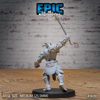 Unpainted grey resin miniature of a male tribal barbarian photographed from the rear, showing the engraved knotwork on his shoulder guard, axe held aloft, fur and hide trim on his lower garments and boots, on a 25.5mm round black base