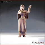 Digital render of Shopkeeper 02 miniature by Novaminis — a female figure with long braided hair in a layered flowing robe with rope belt, one hand raised in refusal and the other cupped forward, viewed from the front