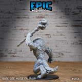 Unpainted grey resin miniature of Yeenoghu the Demon Lord, rear view — showing layered scales across the back, twisted spine detail, and both hands gripping the raised stone maul. Huge 76.5mm base. Epic Miniatures sculpt #4654.