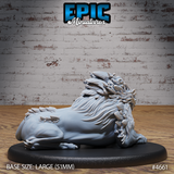 Rear three-quarter view of the same unpainted grey resin sabertooth beast miniature, showing feathered quill-like growths along the spine and haunches, flowing mane detail across the shoulders, and the large 51mm oval base — photographed against a brick wall backdrop