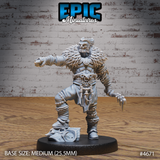 Front view of an unpainted grey resin Beast Master miniature by Epic Miniatures — a heavily muscled male figure in a dynamic combat stance, one fist punching forward and one clawed hand trailing, wearing layered armour plating, thick arm wrappings, a shaggy beast-pelt mantle, and a loincloth, mounted on a 25.5mm round base with rubble scatter