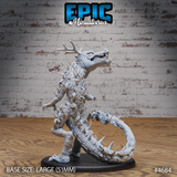 Unpainted grey resin Hunting Reptile miniature from Epic Miniatures — side profile view highlighting the dense overlapping scale texture, prominent dorsal spines, antlered skull turned to one side in a snarling pose, and the full length of the spiked tail sweeping behind the 51mm oval base