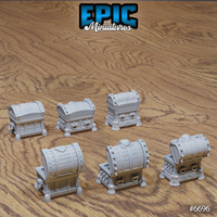 Rear and side view of six unpainted grey resin Lich Crypt Chest scatter terrain pieces by Epic Miniatures — showing three closed barrel-lidded chests in varying ornate styles and three additional closed variants with iron banding, spiked trim, and decorative hardware, photographed on a wooden surface