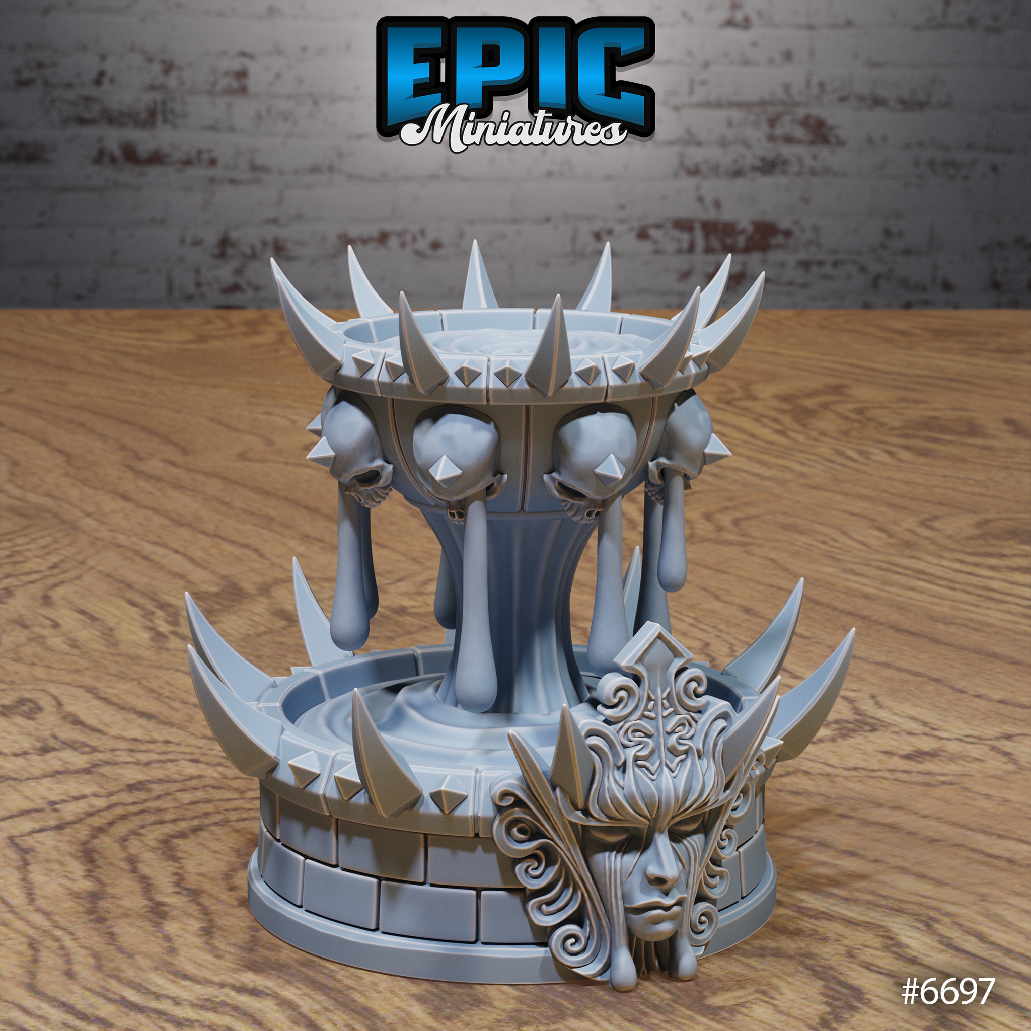 Front view of an unpainted grey resin Blood Fountain terrain piece by Epic Miniatures — a two-tiered dark shrine with a spiked upper crown, weeping skulls, and an ornate carved face on the stone base, printed by Mitz and Simz