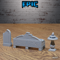 Three unpainted grey resin stone fountain terrain pieces by Epic Miniatures in their destroyed variant — the rectangular basin fountain with cracked and fractured stonework, the pedestal fountain with weathered surfaces, and the wall-mounted lion-head fountain showing aged and broken detail
