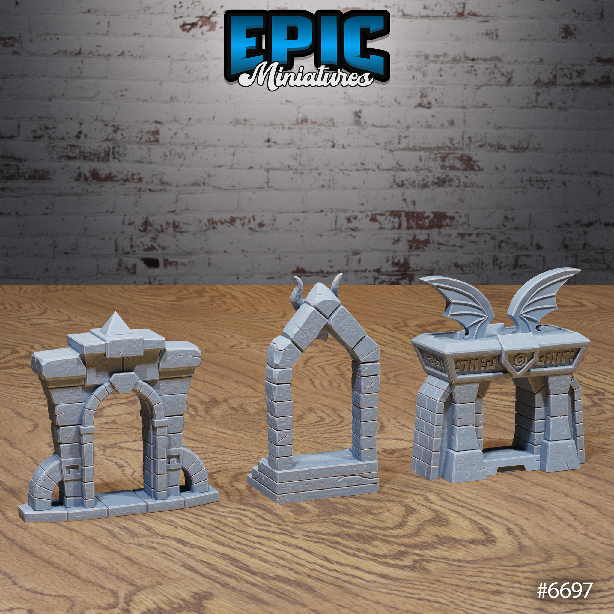 Three unpainted grey resin stone portal terrain pieces by Epic Miniatures shown from a different angle — left: ruined stone archway with spiked cap; centre: demon skull portal without base platform visible; right: bat-wing portal with outstretched wings and carved rune panel. Photographed on a wooden surface.