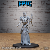 Front view of an unpainted grey resin Vecna miniature by Epic Miniatures — a gaunt lich in flowing robes with exposed ribcage, horned skull face, blade pauldrons, one arm raised with curled fingers and the other in a fist, mounted on a large 51mm black round base