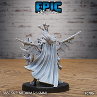 Rear view of the same unpainted grey resin Necro Orc miniature by Epic Miniatures — showing a sweeping dramatic cloak with fine fabric folds, bat wings spread wide on either side, skull-topped antler crown visible from behind, and the bat-winged shield and blade visible at the edges. Medium 25.5mm base size.