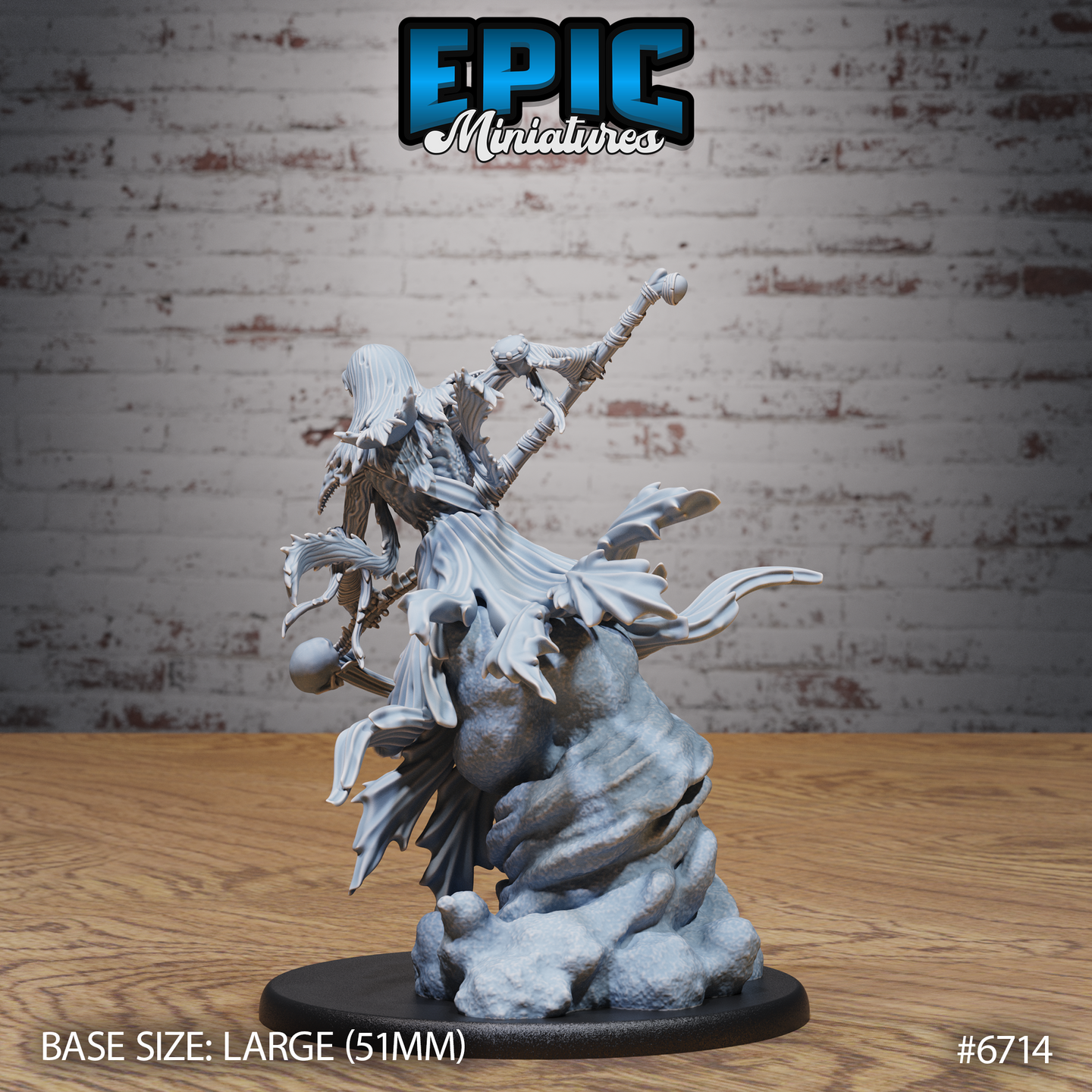 Rear view of the unpainted grey resin Wraith Mother miniature, showing long flowing hair, billowing shredded robes, and the ornate details of her staff and rocky base from behind