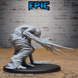 Side view of the unpainted Bone Claw Ambush resin miniature by Epic Miniatures — showing the full crouched pose with both arms outstretched, tattered flowing robes, clawed feet, and a horned skull face, mounted on a large 51mm oval base