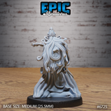 Unpainted grey resin miniature of an Experienced Lich by Epic Miniatures — rear view revealing long cascading tendrils of tattered spectral hair flowing down the back, sweeping cloak merging into the base, and one arm extended to the side, mounted on a medium 25.5mm base