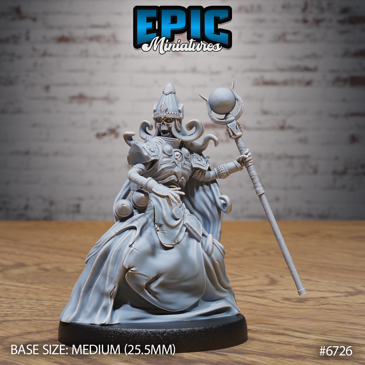Unpainted grey resin miniature of a female lich in ceremonial robes, photographed from the front. She wears a tall ornate mitre helm over a skeletal face framed by flowing hair, holds an orb-topped staff in her right hand, and extends bony fingers of her left hand in a commanding gesture. Skull motifs decorate her chest armour. Mounted on a 25.5mm medium base. Epic Miniatures #6726.