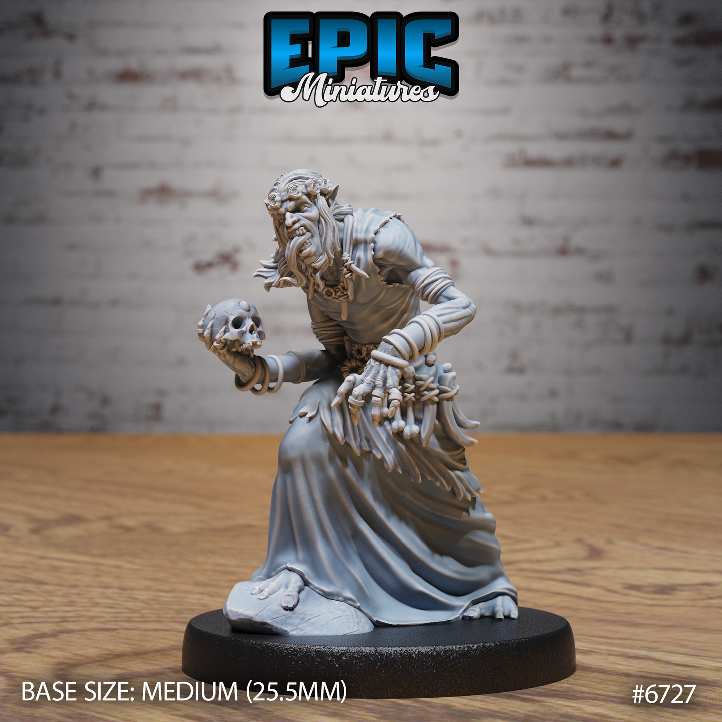 Front view of an unpainted grey resin Ghoul Gravecaller miniature by Epic Miniatures — a gaunt, hunched ghoulish figure in ragged robes clutching a humanoid skull in one clawed hand, adorned with strings of small bones across his belt and sash, mounted on a medium 25.5mm round base
