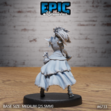 Rear view of an unpainted grey resin 32mm Revenant Headhunter miniature by Epic Miniatures — showing wild feathered hair, articulated back armour, and a dramatic billowing layered skirt with frilled edges, mounted on a medium 25.5mm round black base