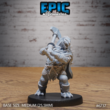 Front view of an unpainted grey resin 32mm Turtlefolk Grave Robber miniature by Epic Miniatures, showing a snarling Tortle figure mid-swing with a heavy maul raised overhead, wearing rope-bound armour, a flowing spiked cape, and chainmail skirting, clawed feet planted wide on a medium round base