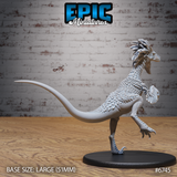 Unpainted grey resin raptor miniature on a large 51mm black base, photographed from the rear-right. The rear view shows the sweeping counter-balancing tail, detailed scale texture across the back and haunches, feathered arm plumage, and the fanned head crest turned in profile. Sickle-shaped toe claws are clearly visible.