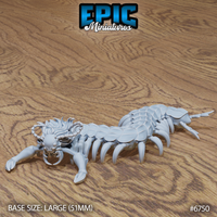 Unpainted grey resin miniature of a primal centipede — front-facing pose with frilled mane extended, forelimbs outstretched, and rows of curved claws visible along a segmented armoured body. Large 51mm base. Photographed by Epic Miniatures.