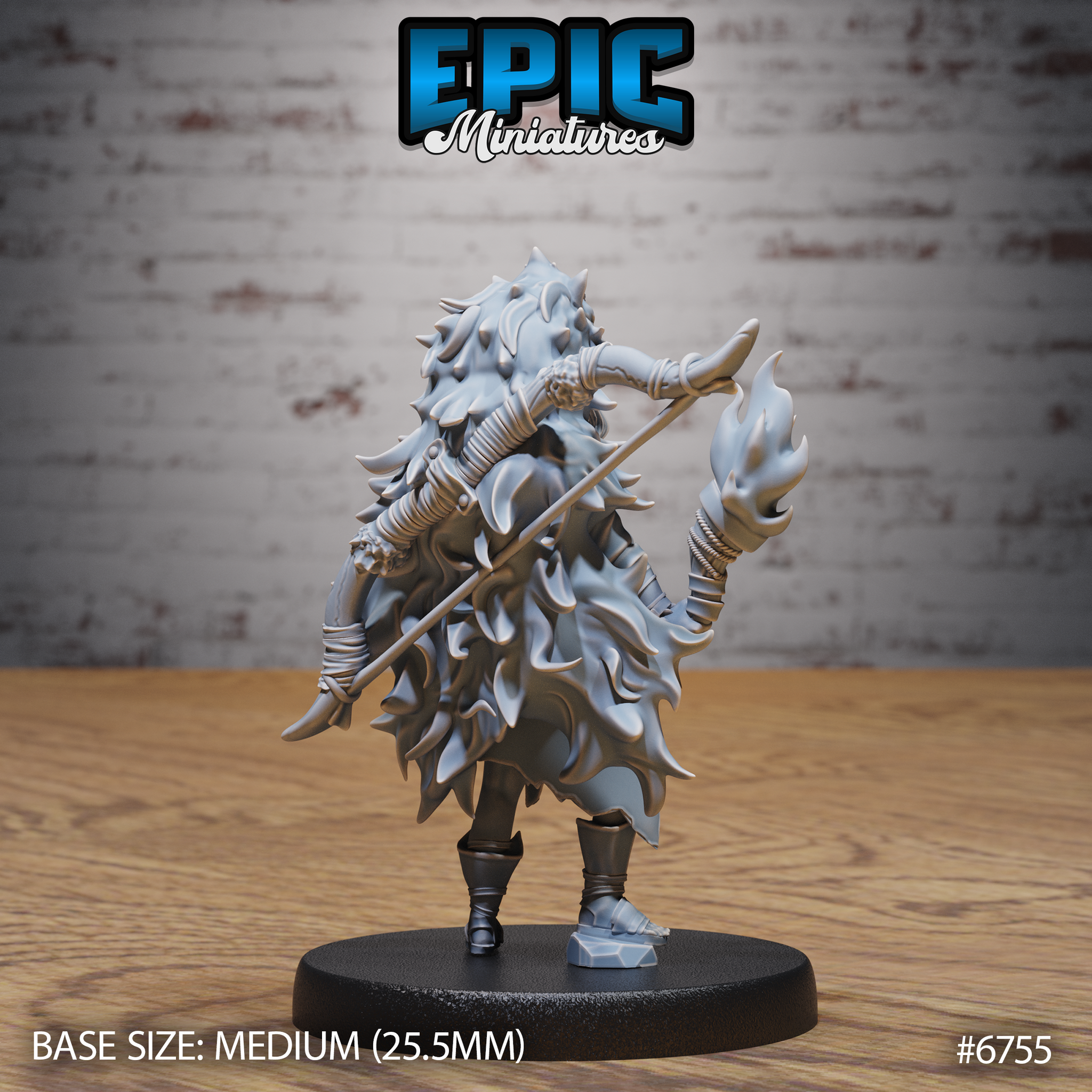 Rear view of the same unpainted grey resin Amazoness Champion miniature, showing her spiked beast-pelt cloak spread wide, a staff crossed across her back, cord-wrapped arms, and detailed boot wrappings on a medium 25.5mm round black base