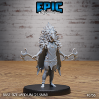 Front view of an unpainted grey resin Amazoness Raven Cleric miniature at 32mm scale, showing a barefoot female figure wearing a dramatic layered feather headdress with a bird mask, outstretched arms holding twin crescent-bladed ritual weapons, and a ragged ceremonial tunic, mounted on a medium 25.5mm black base