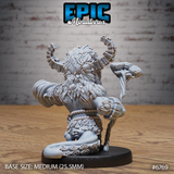Rear view of the Void Shaman resin miniature showing dense layered feather and pelt detailing across his back, ringed segmented horns, a coiling tentacle curling behind his legs, and the fungal staff gripped in one clawed hand