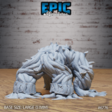 Unpainted grey resin Shambling Mound crawling miniature from Epic Miniatures, viewed from front-right. The creature's four root-limb legs are clearly visible with worn shackle bands near the ground. The back of the sculpt shows deeply layered fibrous strands and organic texture throughout. Large 51mm base. Product number 6776.