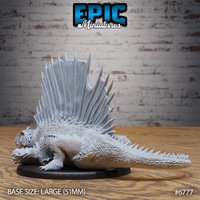 Side profile of an unpainted grey resin Dimetrodon miniature by Epic Miniatures on a 51mm black round base. The full length of the creature is visible — from open jaws and clawed forefeet to the long spine-lined tail — with the tall dorsal sail dominating the silhouette.