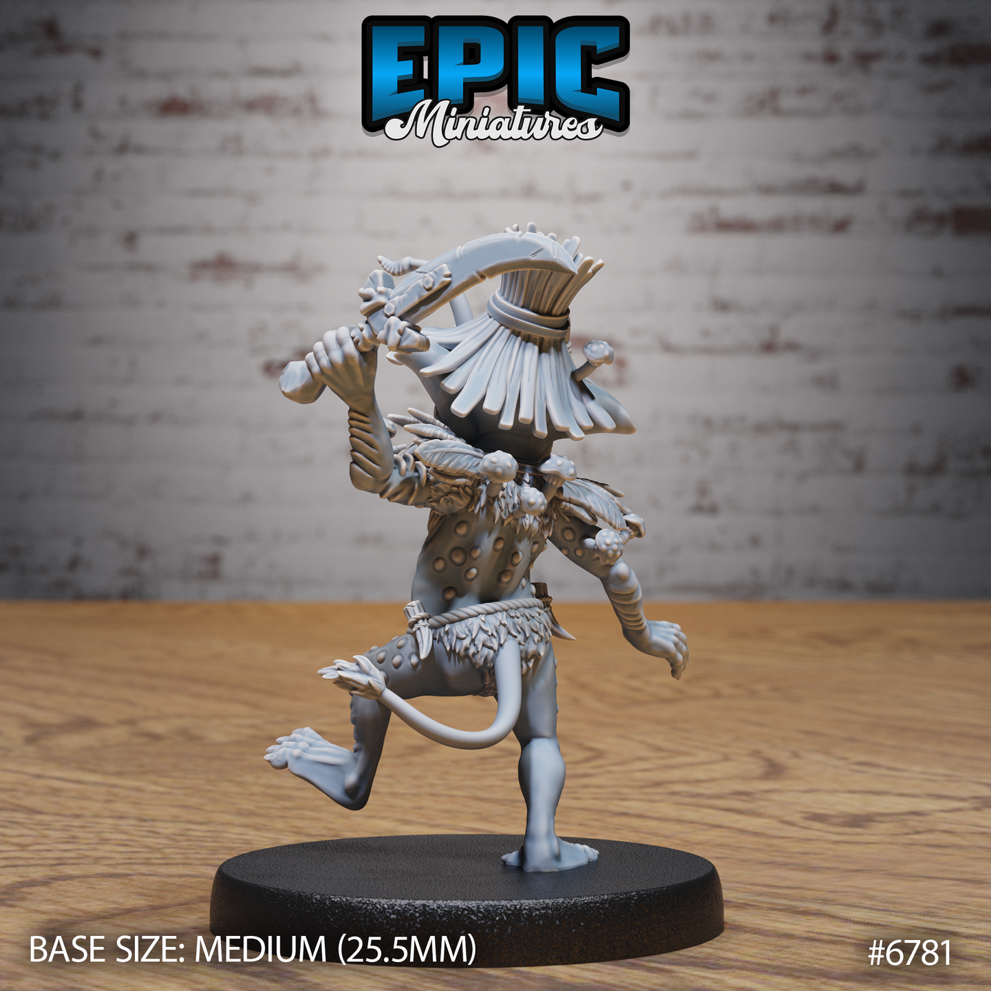 Rear view of the same unpainted grey resin jungle goblin miniature showing a broad flat-brimmed headdress with decorative fringe, spotted warty back and legs, rope loincloth, and dynamic attack pose with bone club extended